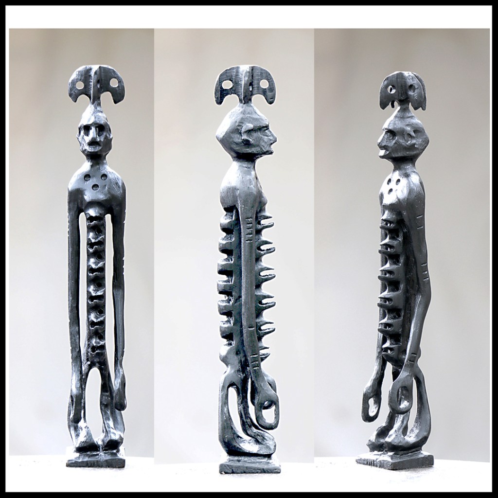 wood carving sculpture www.sawdustriver.com