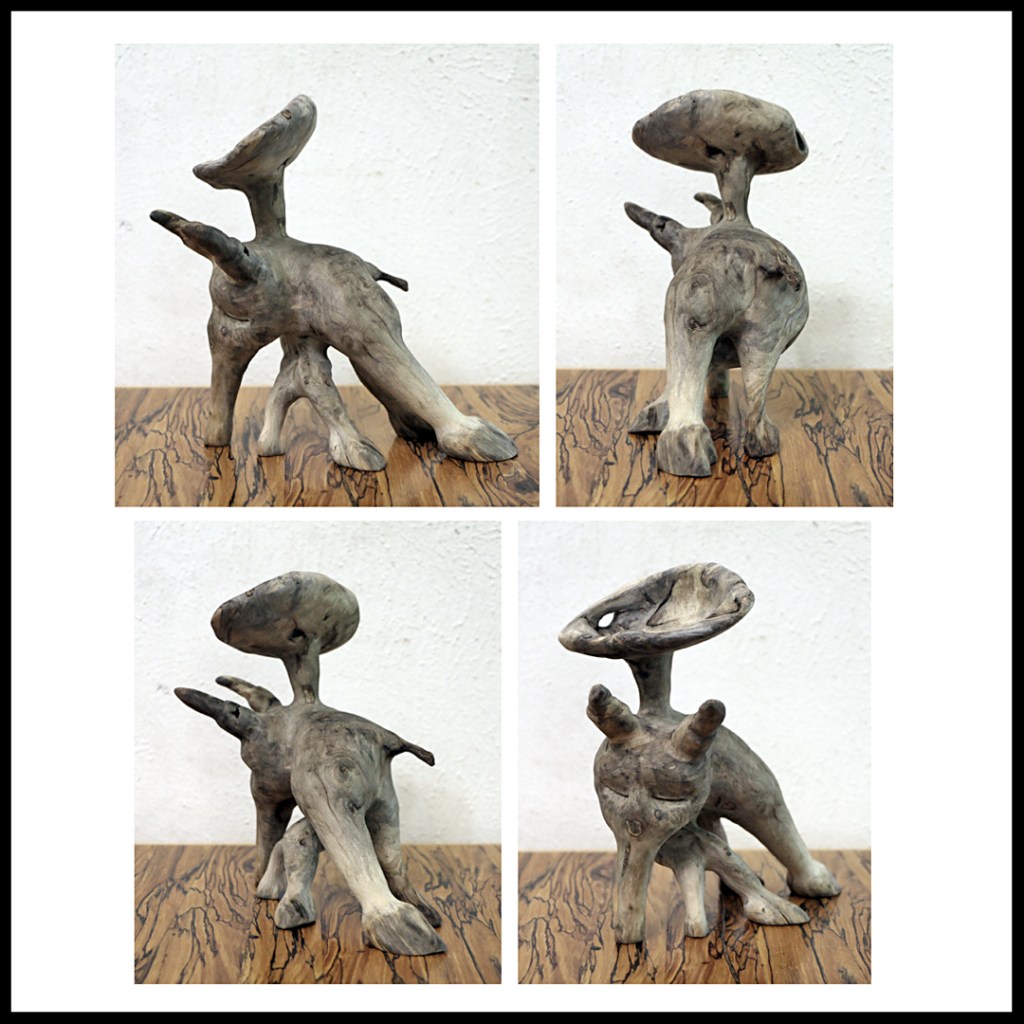 wood carving sculpture www.sawdustriver.com