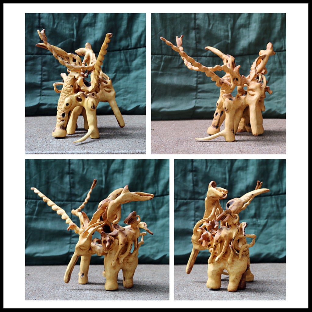 wood carving sculpture www.sawdustriver.com