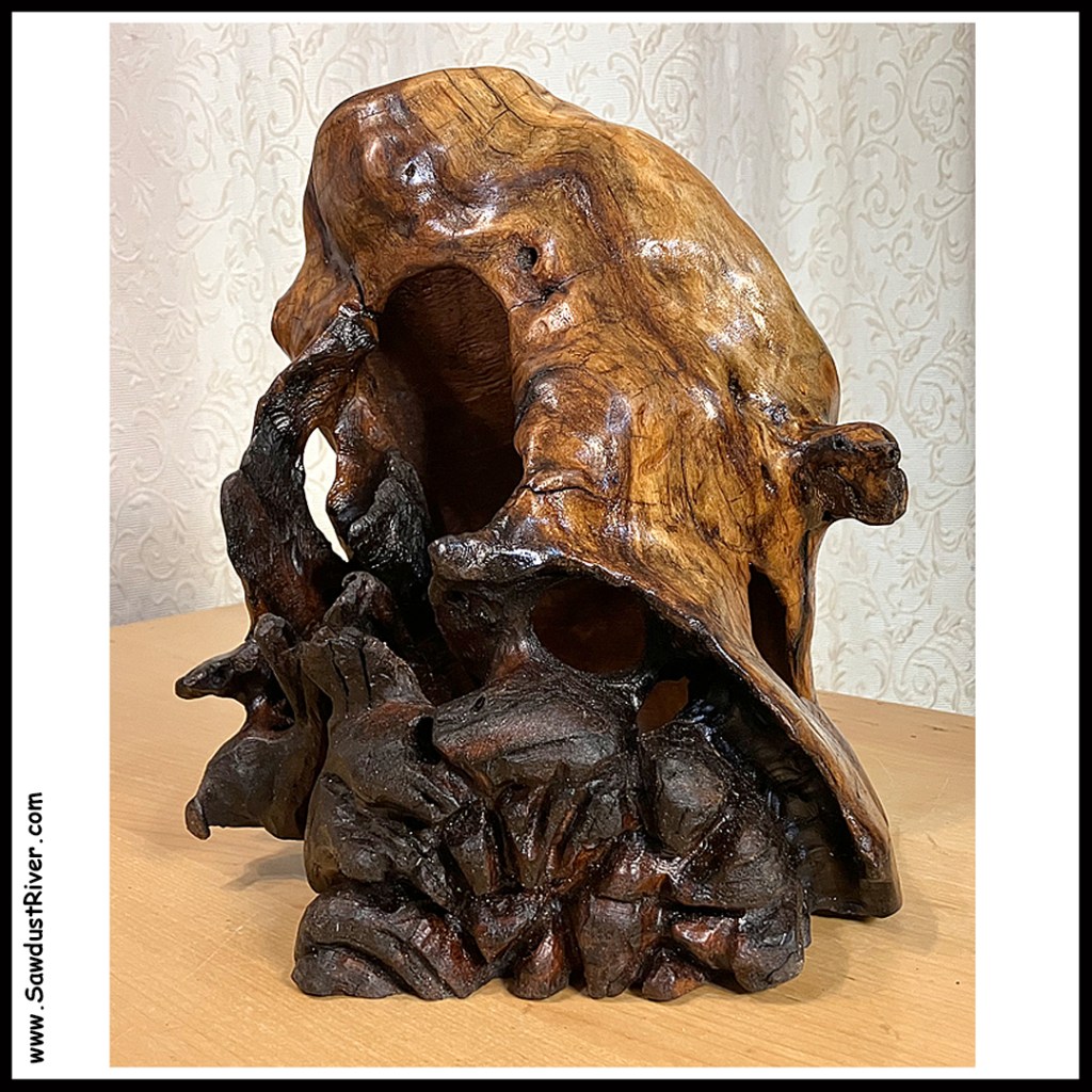 wood sculpture carving www.SawdustRiver.com